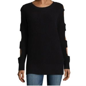 Knit sweater with sleeve cutouts